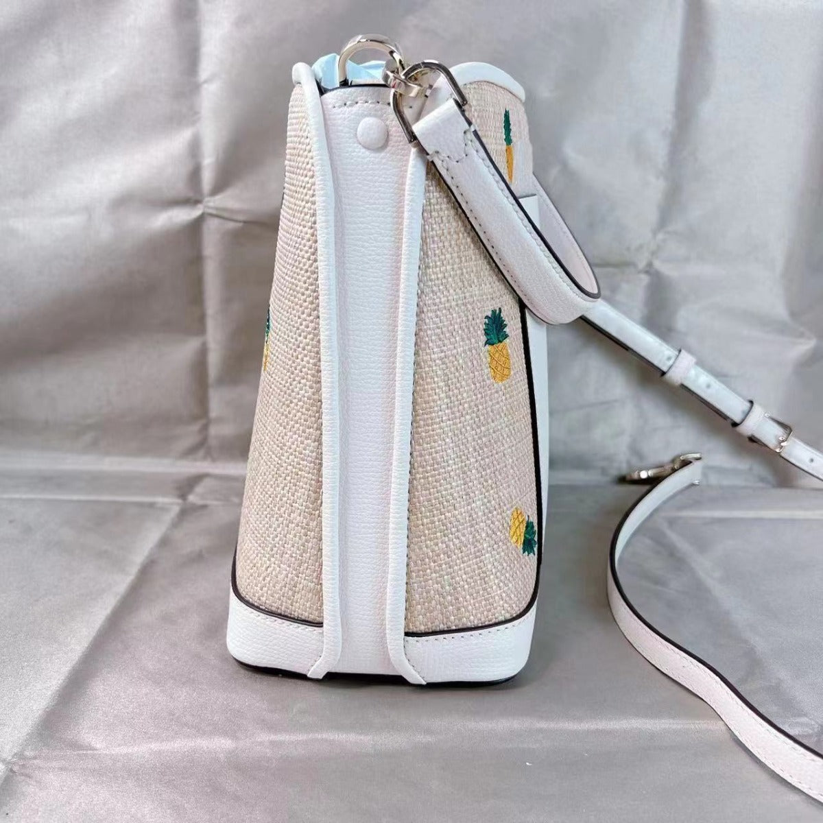 Kate Spade k7288 darcy small pineapple bucket bag in parchment multi Kate Spade k7288 darcy small pineapple bucket bag in parchment multi